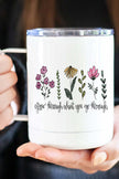 Grow Through Travel Cup with floral design and motivational text, perfect for enjoying warm beverages on the go.