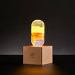 Yellow Orange Swirl Glass Decorative Lamp Bulb with Wooden and Metal Base