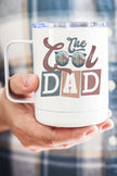 Cool Dad Coffee Cup with stylish design held by a person, perfect for sipping beverages on the go.