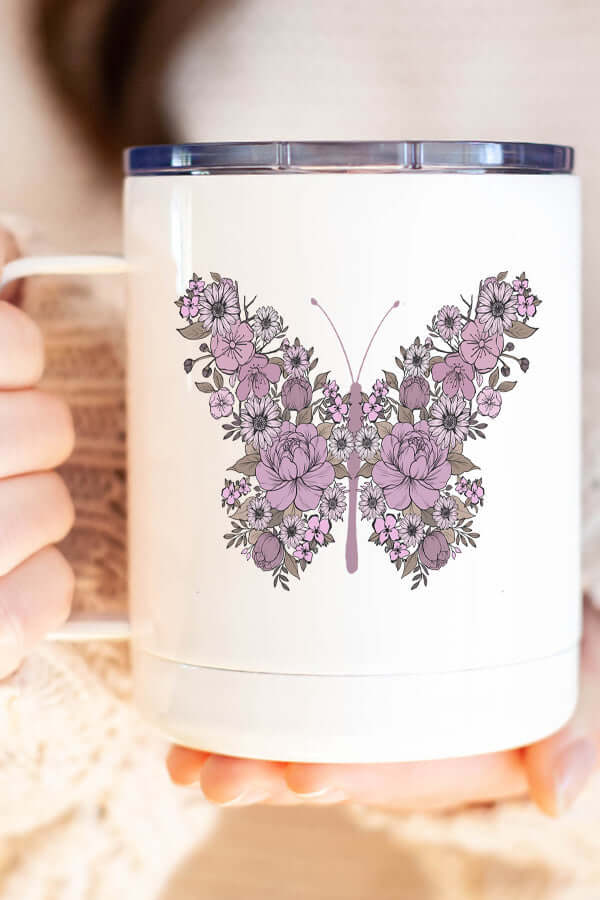Floral butterfly coffee cup design featuring detailed purple flowers, perfect for travel and outdoor adventures.