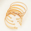 Gold-Tone Engraved Bangle Bracelet Set – Multi-Design Cuff Stack