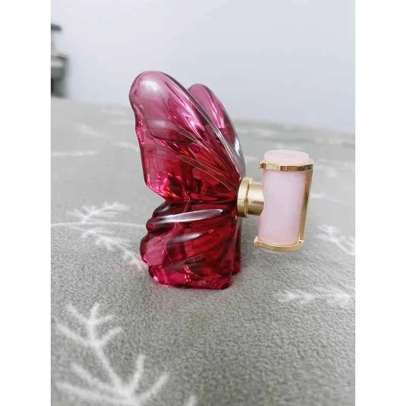 LA Bom. b.A 2.7oz female perfume, fresh flower and fruit fragrance, dragon fruit integration, unique butterfly design