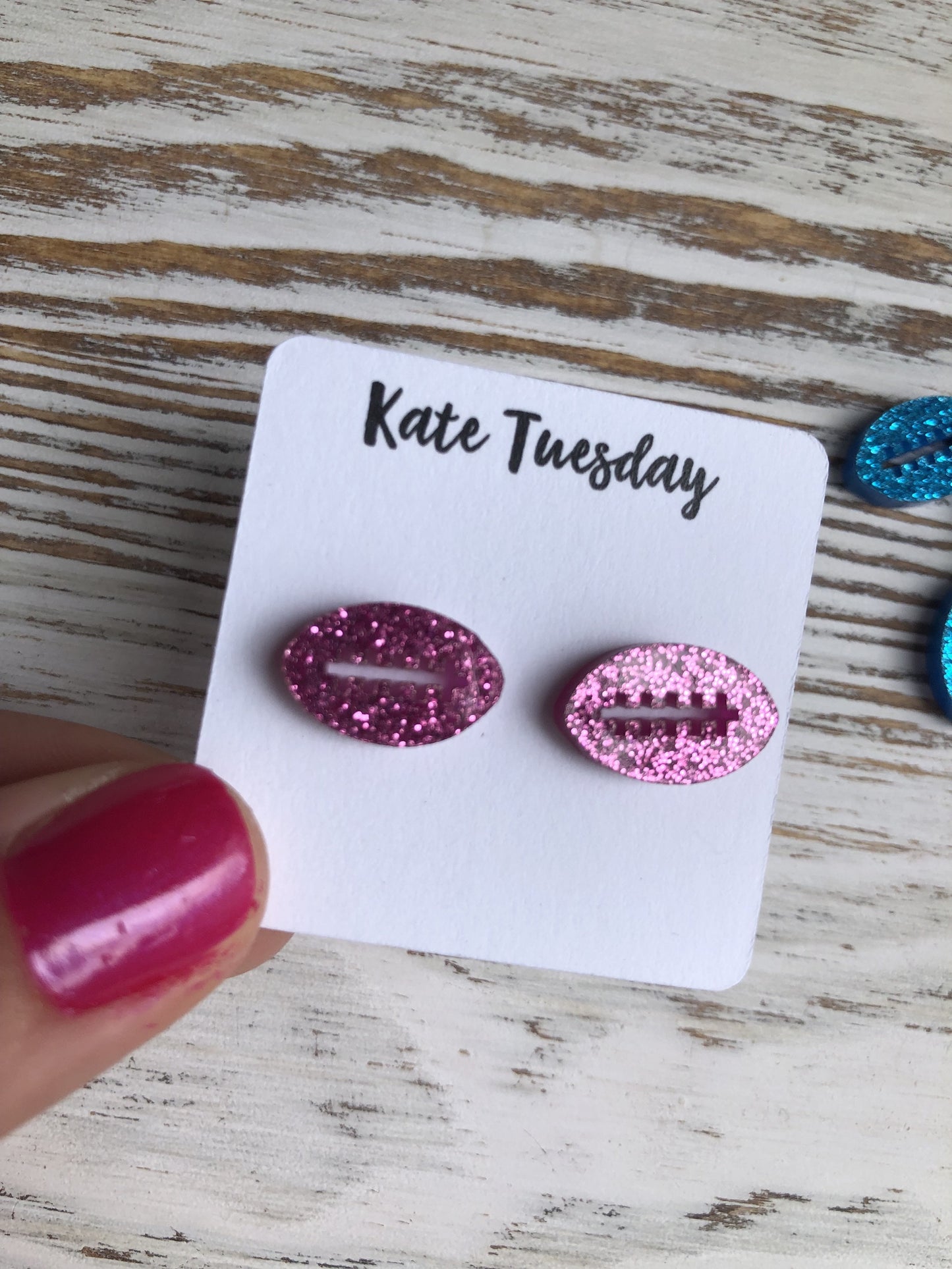 Magenta Football Sparkly Stud Earrings