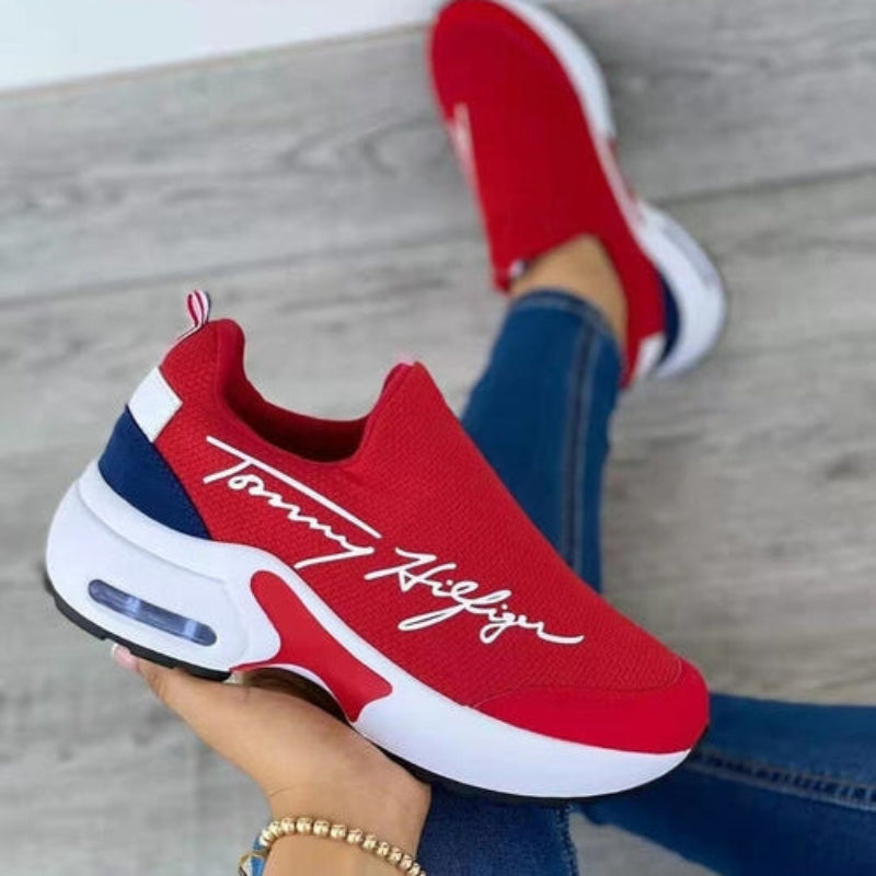 Tommy Hilfiger Slip-On Sneakers with Red, White, and Black Design