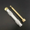 Portable Metal Fire Piston with Brass-Coloured Rod and Knurled Grip for Camping Survival