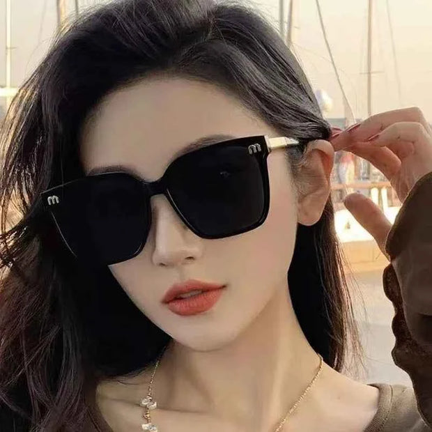 Luxury Black Sunglasses with Gold Accents – Stylish Square Frame with UV Protection