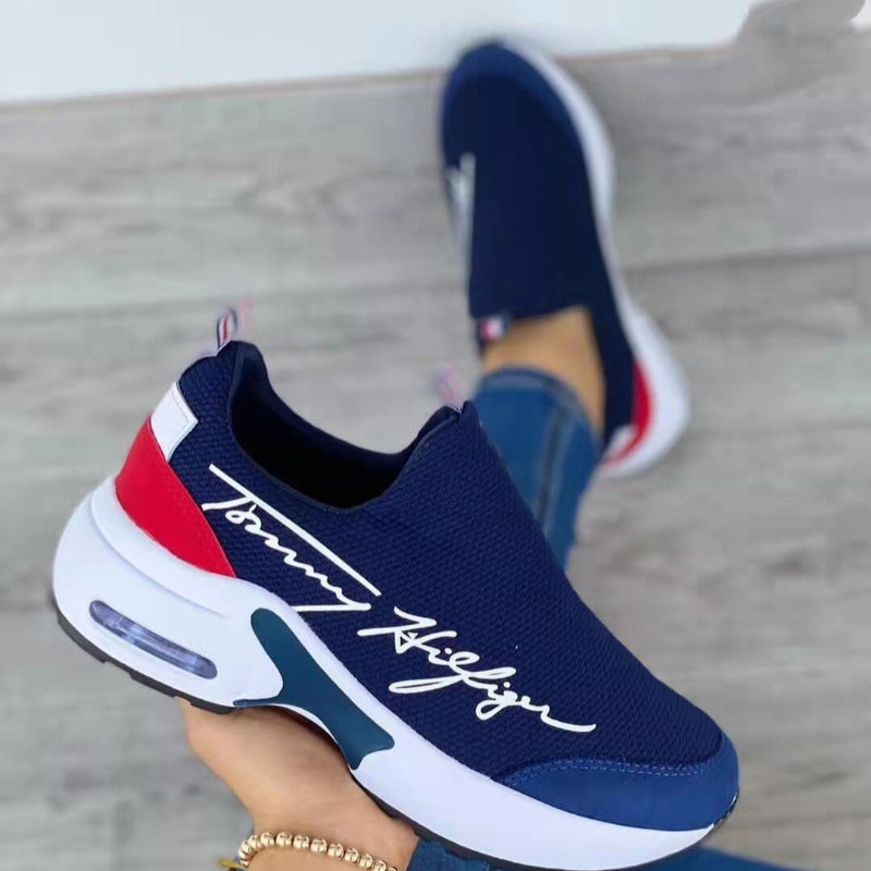 Tommy Hilfiger Slip-On Sneakers with Red, White, and Black Design