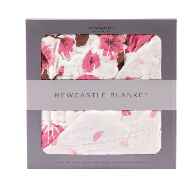 Cherry Blossom Bamboo Muslin Newcastle Blanket in packaging with floral design.