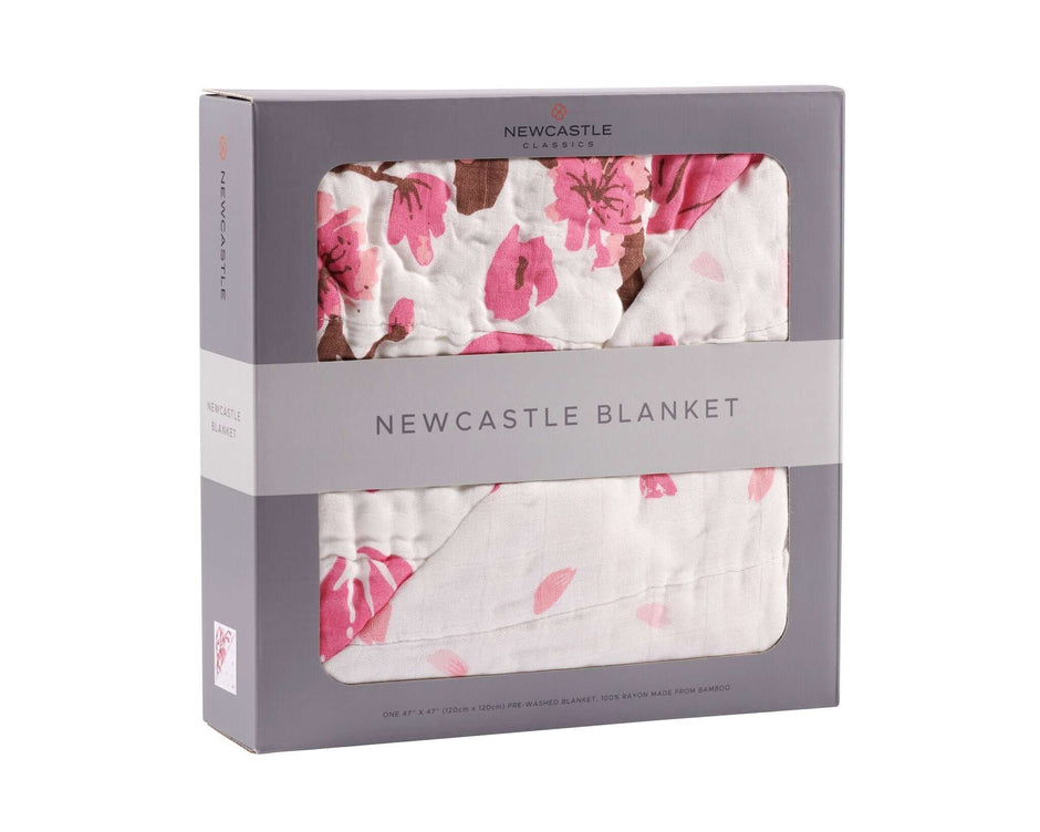 Cherry Blossom Bamboo Muslin Newcastle Blanket packaging with floral design in pink and white.