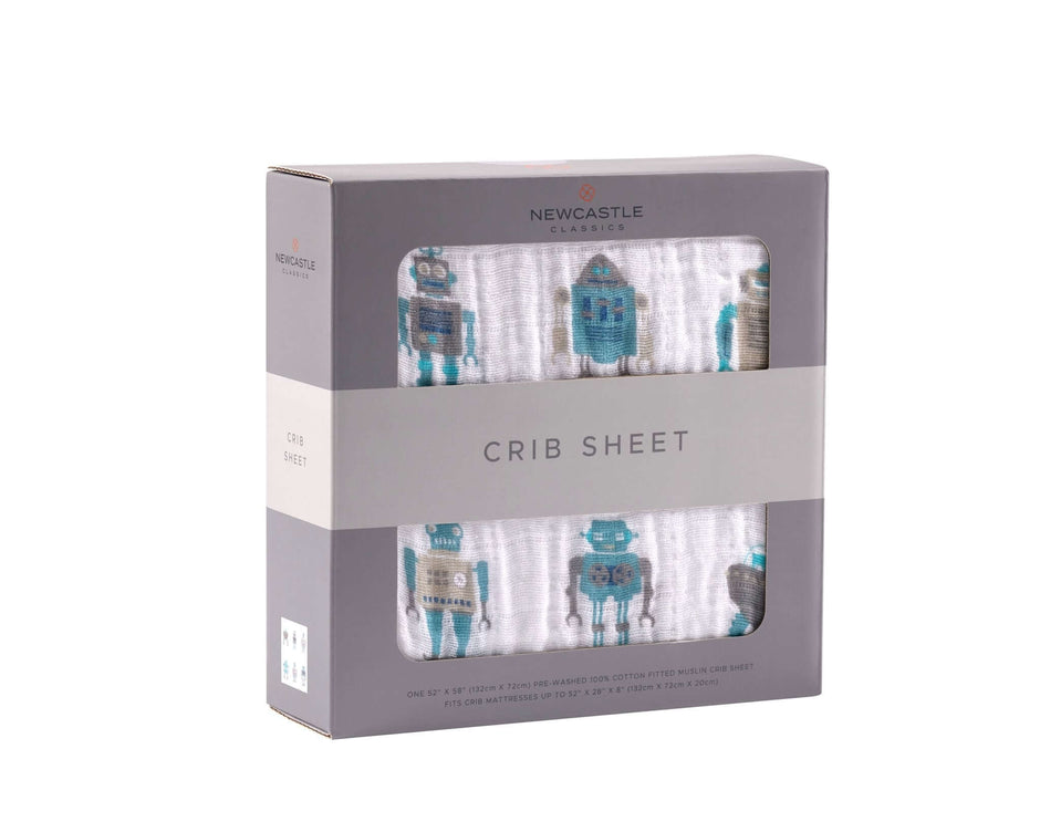 Cotton crib sheet featuring playful robot designs in blue and white packaging, ideal for nursery decoration.