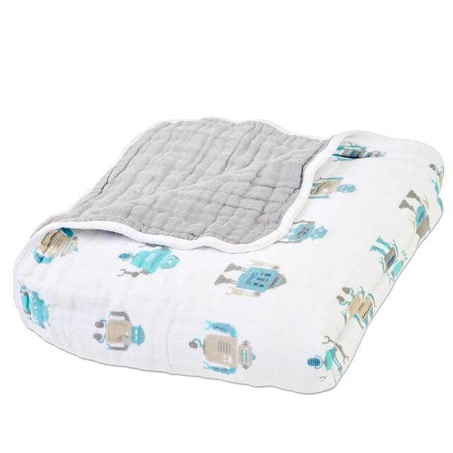 Cotton baby blanket featuring playful robot design and soft gray underside, perfect for infants.