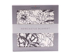 American Rose Newcastle Blanket packaging with floral design, ideal for cozy home decor and warmth.