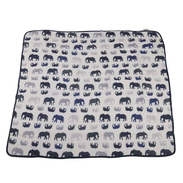 Blue elephants blanket featuring various elephant patterns on a neutral background, perfect for décor and comfort.