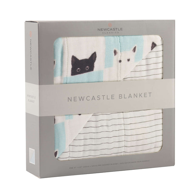 Peekaboo Cats Blanket featuring playful designs of black and white cats on soft fabric for cozy comfort.