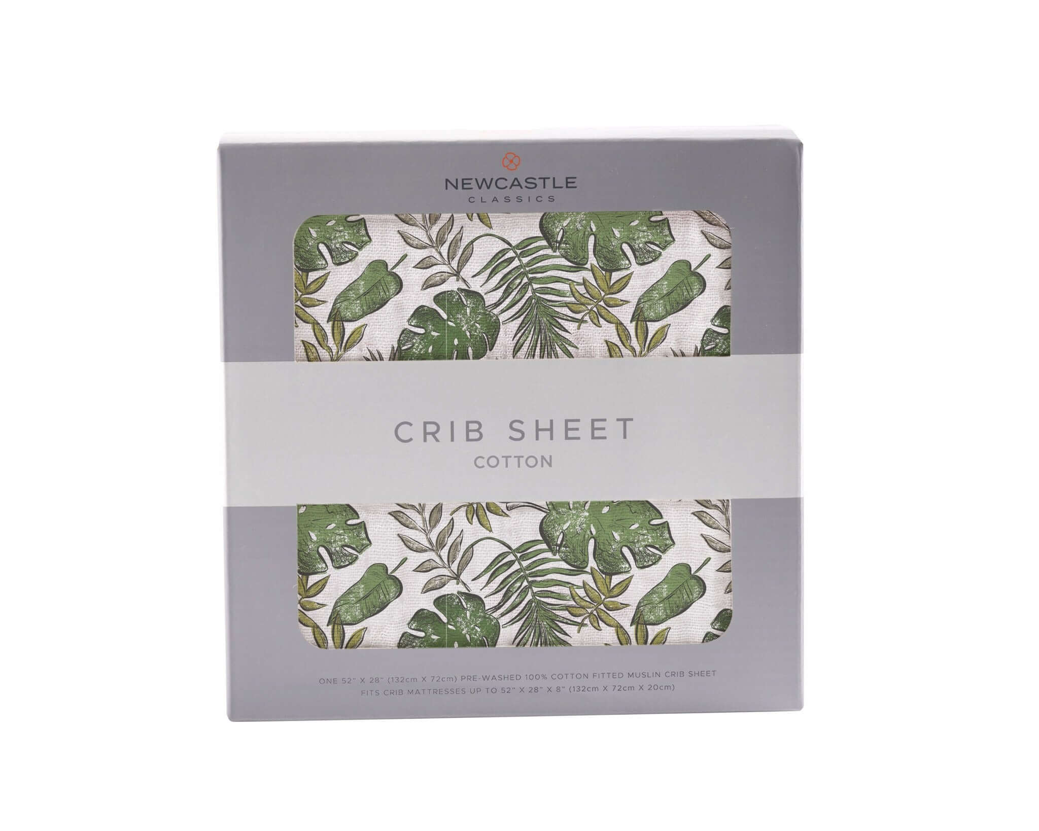 Tropical crib sheet with green leaf pattern in a box, made from soft cotton for comfortable baby bedding.