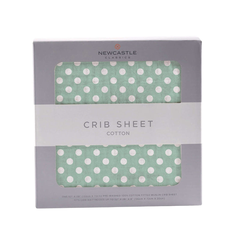 Jade Polka Sheet featuring white polka dots on a mint green background, perfect for crib bedding.