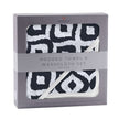 Moroccan hooded towel and washcloth set featuring a stylish black and white geometric design in a gift box.