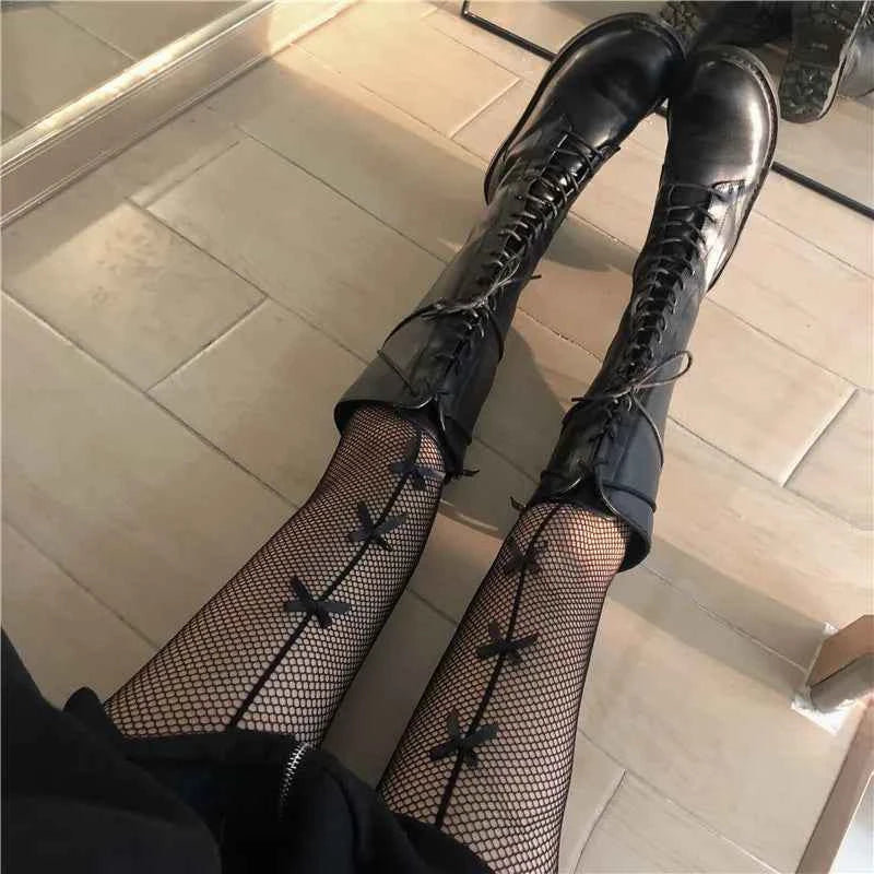 Fishnet Stockings with Bow Detailing | White & Black Lace-Up Hosiery