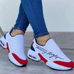 Tommy Hilfiger Slip-On Sneakers with Red, White, and Black Design