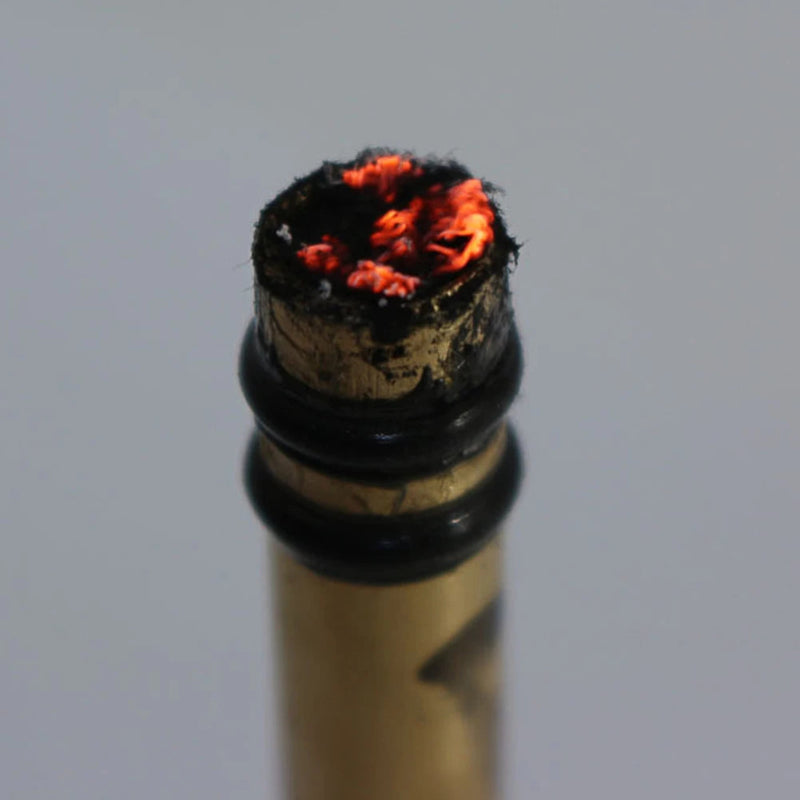 Portable Metal Fire Piston with Brass-Coloured Rod and Knurled Grip for Camping Survival