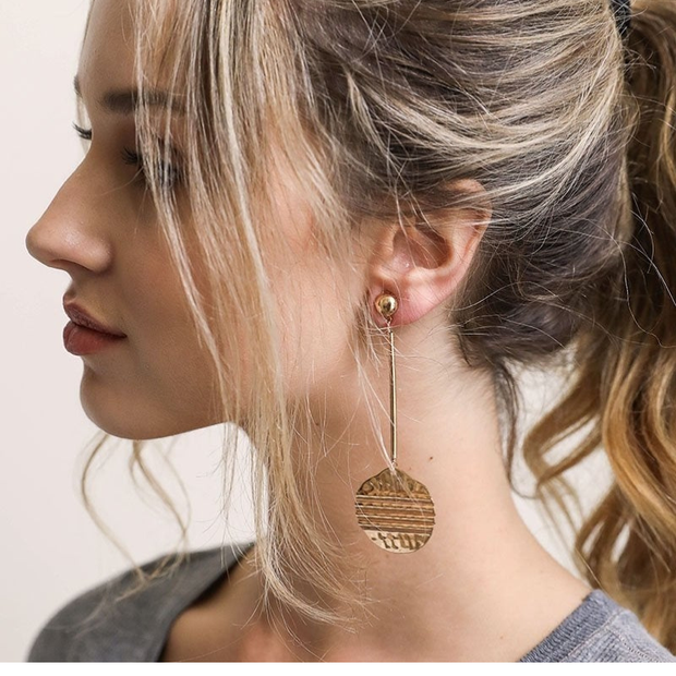 Boucles d'oreilles en pièces de monnaie romaines