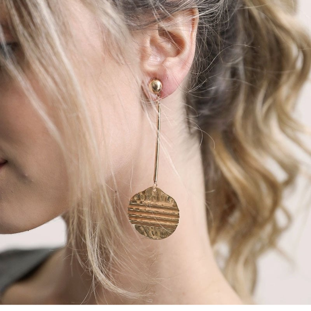 Boucles d'oreilles en pièces de monnaie romaines