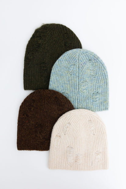 Gorros de punto desgastados.