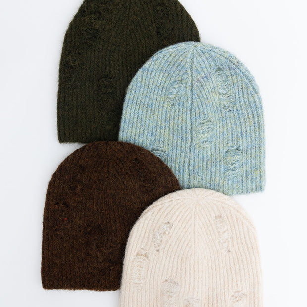 Gorros de punto desgastados.