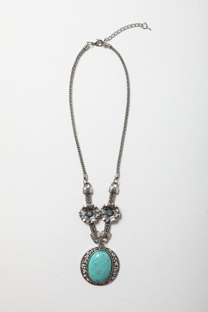 Colliers floraux en pierre turquoise.