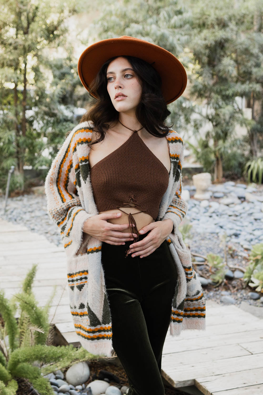 Ruanas de bolsillo de pelo sintético.