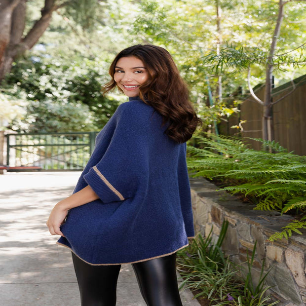 Ponchos à col roulé avec manches.