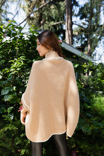 Ponchos à col roulé avec manches.