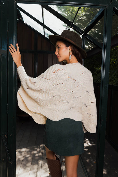 Ponchos en tricot texturé avec manches.