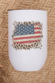 Patriotic leopard tumbler featuring USA flag design and stylish leopard border on textured background.