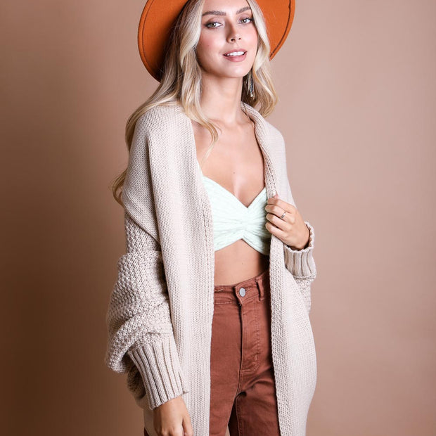 Cardigans en tricot à manches chauve-souris.