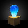 Blue Swirl Glass Decorative Light Bulb with Wooden and Metal Base