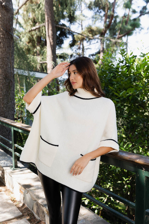Ponchos de cuello alto con mangas.