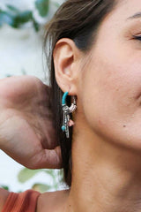 Boucles d'oreilles créoles à plumes délicates