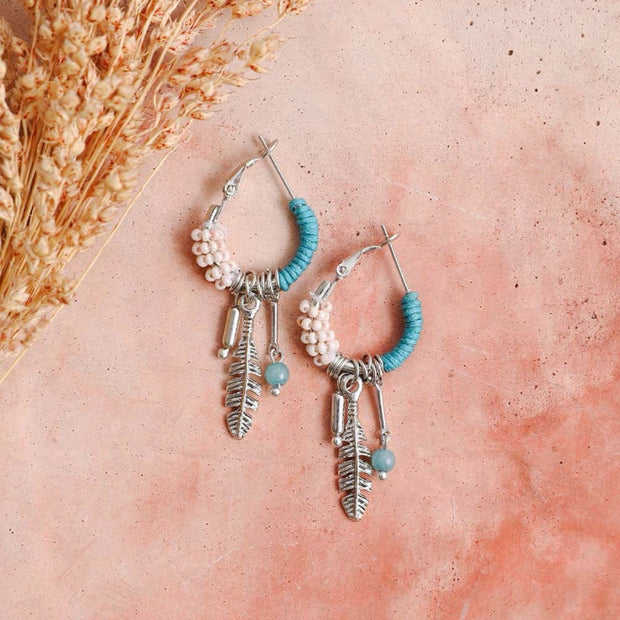 Dainty Feather Charm Hoop Earrings with Beads and Tassel Details