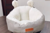 Cama de gato acogedora y de peluche