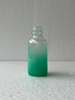 Teal Liquid Bottles