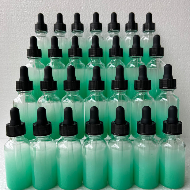 Teal Liquid Bottles