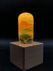Yellow Orange Swirl Glass Decorative Lamp Bulb with Wooden and Metal Base