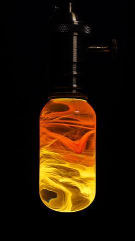 Yellow Orange Swirl Glass Decorative Lamp Bulb with Wooden and Metal Base