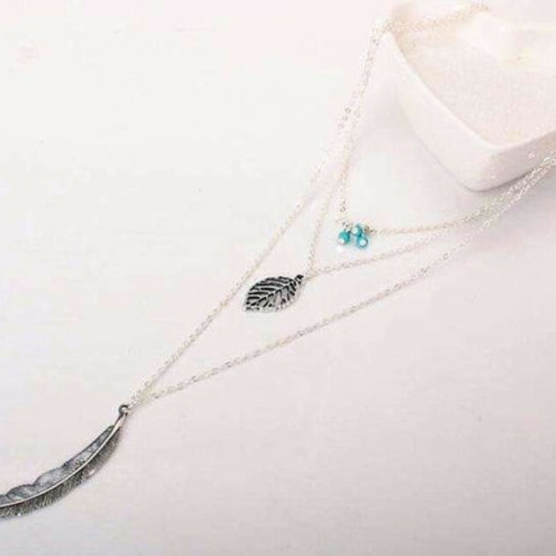 Turquoise Feather Charm