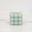 Bougie en cire à bulles sculptées
