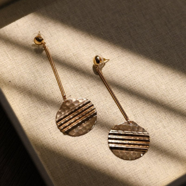 Pendientes de moneda romana
