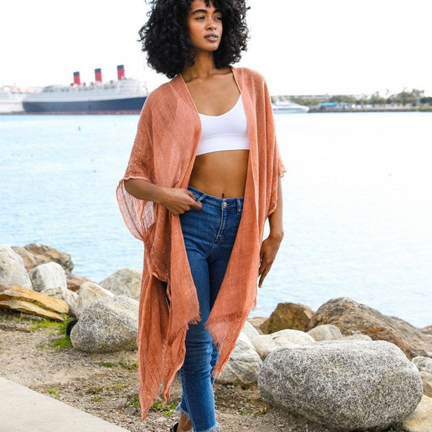 Kimonos deshilachados con borde de lentejuelas.