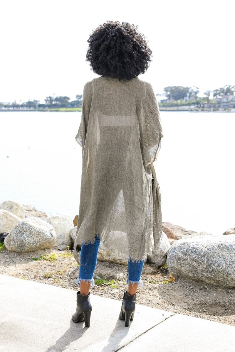 Kimonos deshilachados con borde de lentejuelas.