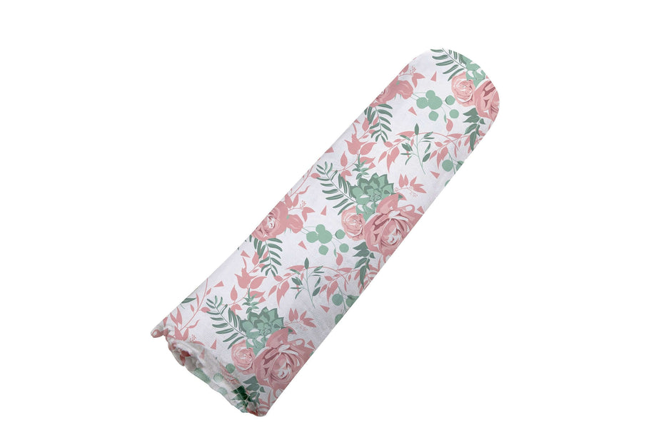 Desert Rose Swaddle featuring a floral design with roses, perfect for keeping your baby snug and comfortable.